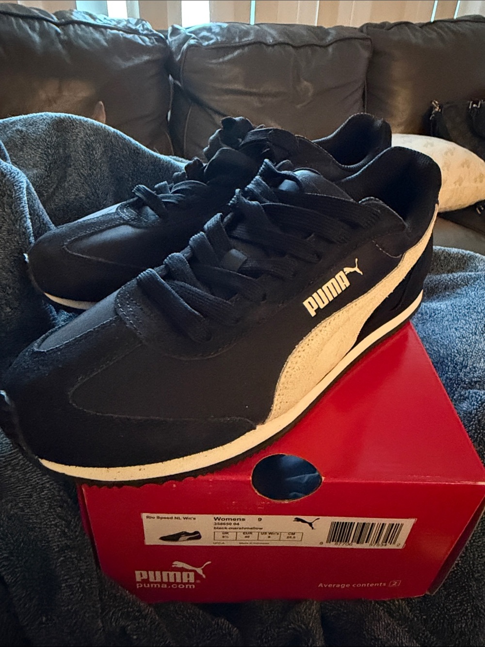 Puma Women’s Black with White Stripe Low-Top Sneakers